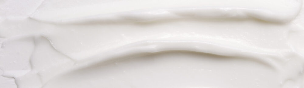 Cosmetic liquid cream for skin white background texture White liquid cosmetics. cream texture background